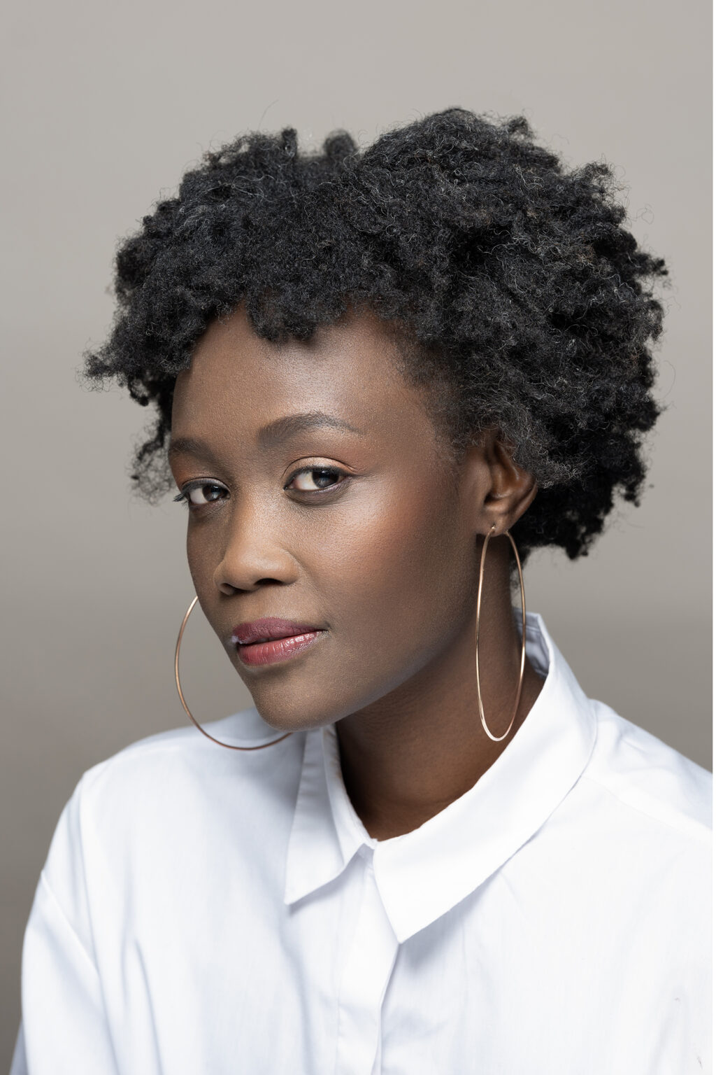 Editorial portrait of a Cape Town model photographed in studio.