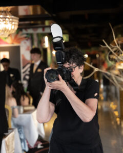 Professional photographer covering an indoor event in Cape Town