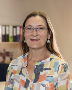 On-location corporate headshot with a workplace background