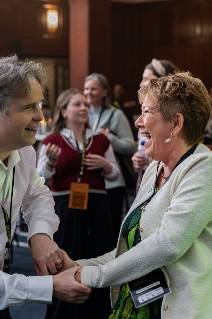 Guests sharing a laugh during a corporate networking event in Cape Town