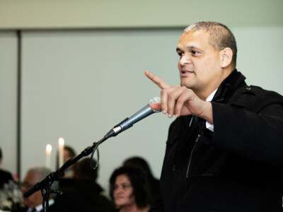 Keynote speaker addressing corporate audience at Cape Town conference venue